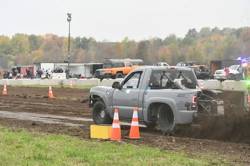 Top Gun launching at a dirt drag, dirt flying